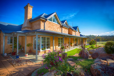 Mountain style home design photo in Perth