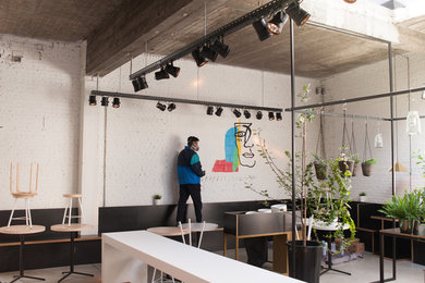 Example of an urban dining room design in Other