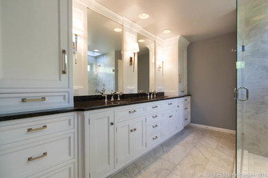 Mid-sized traditional master bathroom in Philadelphia with an undermount sink, beaded inset cabinets, white cabinets, granite benchtops, a corner shower, a one-piece toilet, white tile, ceramic tile, grey walls and ceramic floors.