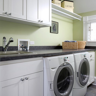 Inspiration for a medium sized classic single-wall separated utility room in Chicago with shaker cabinets, white cabinets, green walls, slate flooring, a side by side washer and dryer and a built-in sink.