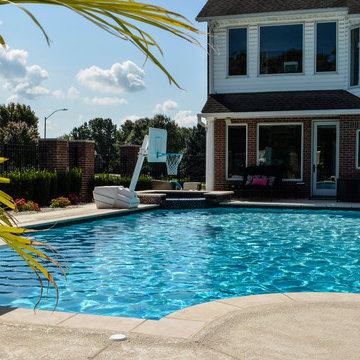 Grecian swimming pool with L, diving board and hot tub