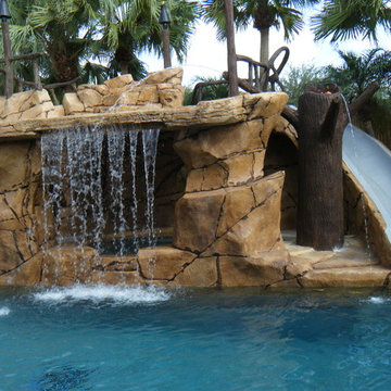 Custom Rock Waterfall with Cave and Rock Spa and Slide