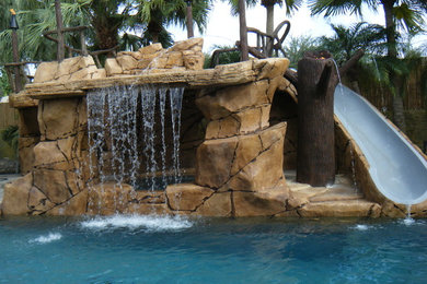 Custom Rock Waterfall with Cave and Rock Spa and Slide