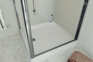 This is an example of a bathroom in West Midlands with white worktops.