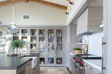 Example of a tuscan kitchen design in Orange County