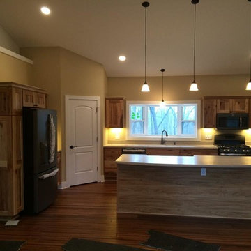 Rustic Hickory cabinets, with Corian countertops