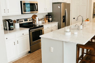 Example of a classic kitchen design in Other