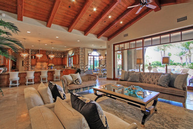 Living room - large transitional open concept travertine floor and beige floor living room idea in San Diego with white walls