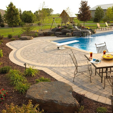 Multi-Purpose Patio: Paver patio with waterfall and pool