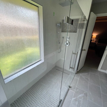 Shower/tub conversion to enlarged shower