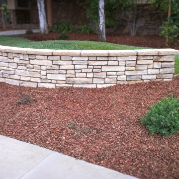 Stone Wall Detail: Cream Stonework and New Garden Bed