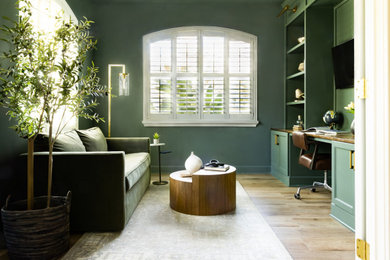 Transitional home office photo in Tampa with green walls