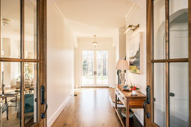 Example of a farmhouse entryway design in Other