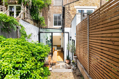 Inspiration for a contemporary rear house exterior in London.
