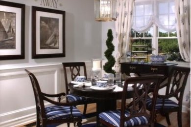 Example of an eclectic dining room design in New York