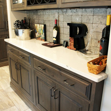 Rustic Alder Cabinets with Apron Front Farm Sink and Dekton Trillum Island