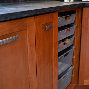 Sleek, Warm Kitchen with custom cabinets