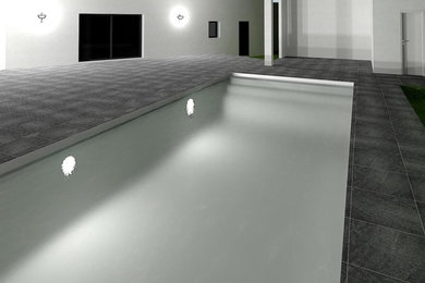 Idée de décoration pour une piscine avant design de taille moyenne et rectangle avec du carrelage.