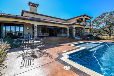 Example of a tuscan exterior home design in Austin