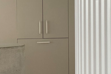 This is an example of a contemporary kitchen in Brisbane.