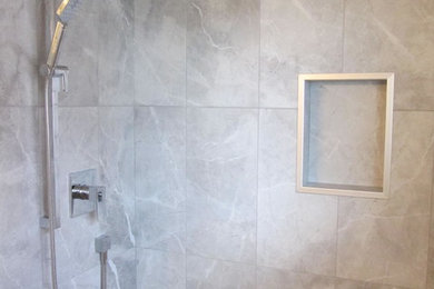 Example of a transitional bathroom design in Toronto
