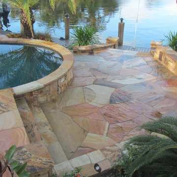 Florida backyard Landscape and stone patios