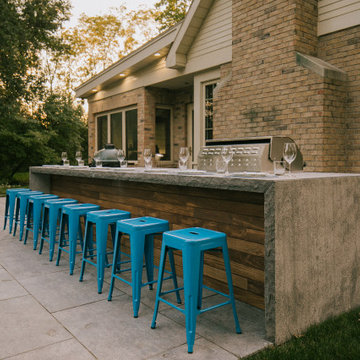 Waterfall Countertop with Sandeka Wood Inlay