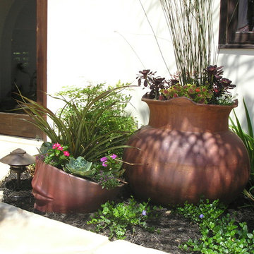 Whimsical fun pots in a courtyard