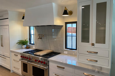 Large cottage kitchen photo in Orange County with an island