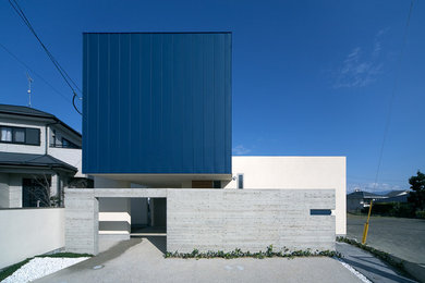 Modern exterior in Fukuoka with a flat roof.