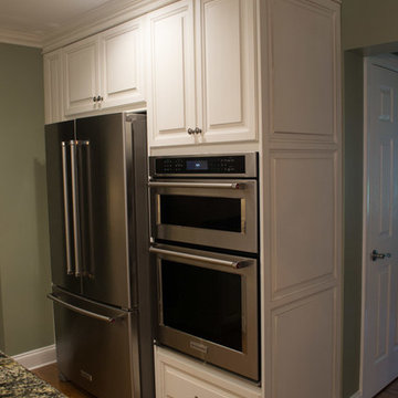 White Tradition Kitchen with a Black Island in Magnolia, DE