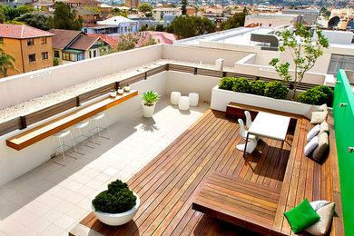 Inspiration for a mid-sized rooftop deck in Sydney.