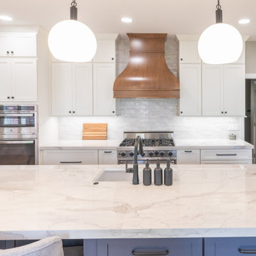 Porcelain Island Kitchen Remodel with Custom Built-Ins + Fireplace Feature