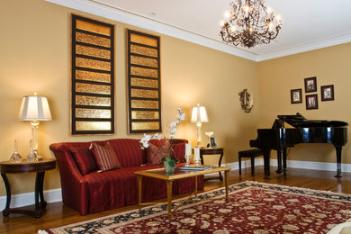 Living room - mid-sized traditional formal and enclosed dark wood floor and brown floor living room idea in New York with beige walls, no fireplace and no tv