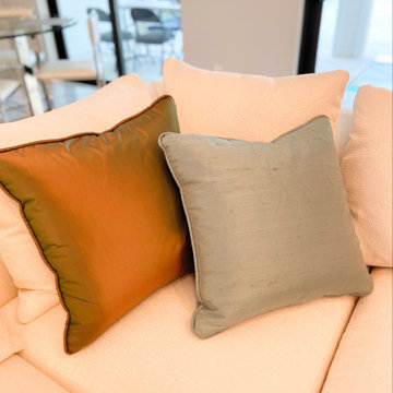 Custom silk pillows to warm up the space and tie in the mineral colors of the ar