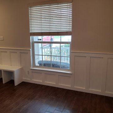 Entry bench and wainscoting paneling