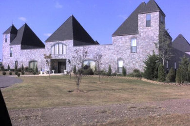 Example of a huge tuscan home design design in Oklahoma City