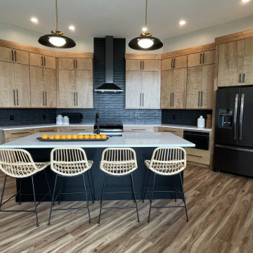 Angled Kitchen Design with Slab Style Cabinets in Pecan Stain