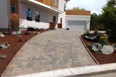Mid-sized modern white flat roof idea in San Diego