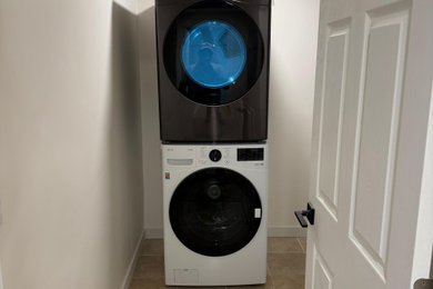 Inspiration for a modern laundry room remodel in Seattle