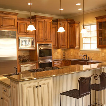 Tropic Brown Granite and Stained cabinets