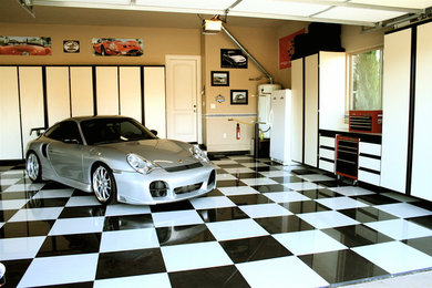 Example of a mid-sized trendy attached three-car garage design in Sacramento