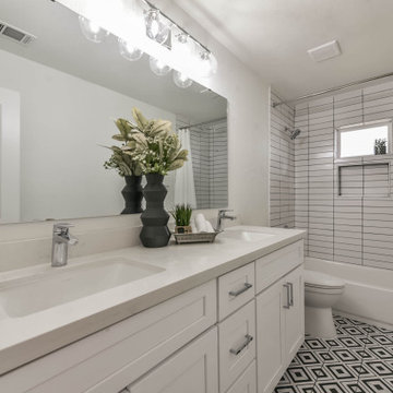 White bathroom with designer tile