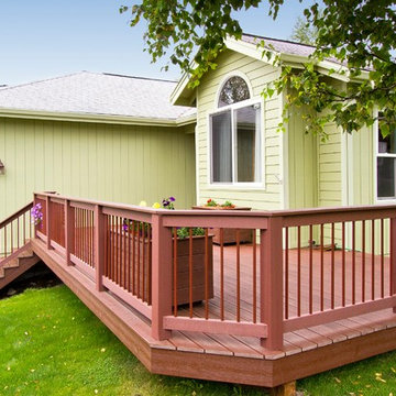 Charming Front Porch with Matching Flower Boxes and Multi-Level Walkway