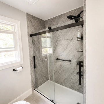 Blue River | Primary Bathroom Granite Walk-In Shower