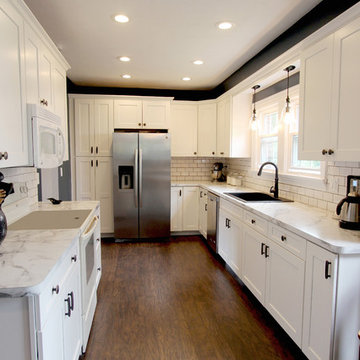 White Kitchen with Marble Look Laminate Countertop ~ Akron, OH