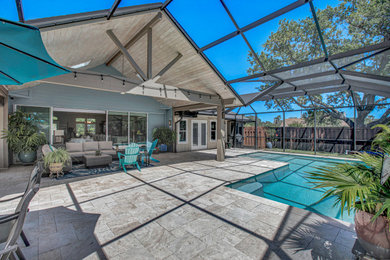 Beach style home design photo in Jacksonville