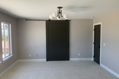 Bedroom - modern master carpeted bedroom idea in Los Angeles with gray walls