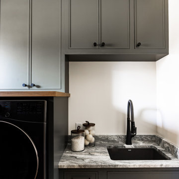 Thoughtfully Designed Mudroom/Laundry Room with Personality