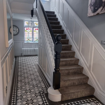 Traditional Hallway renovation with Wall paneling and Victorian tiles